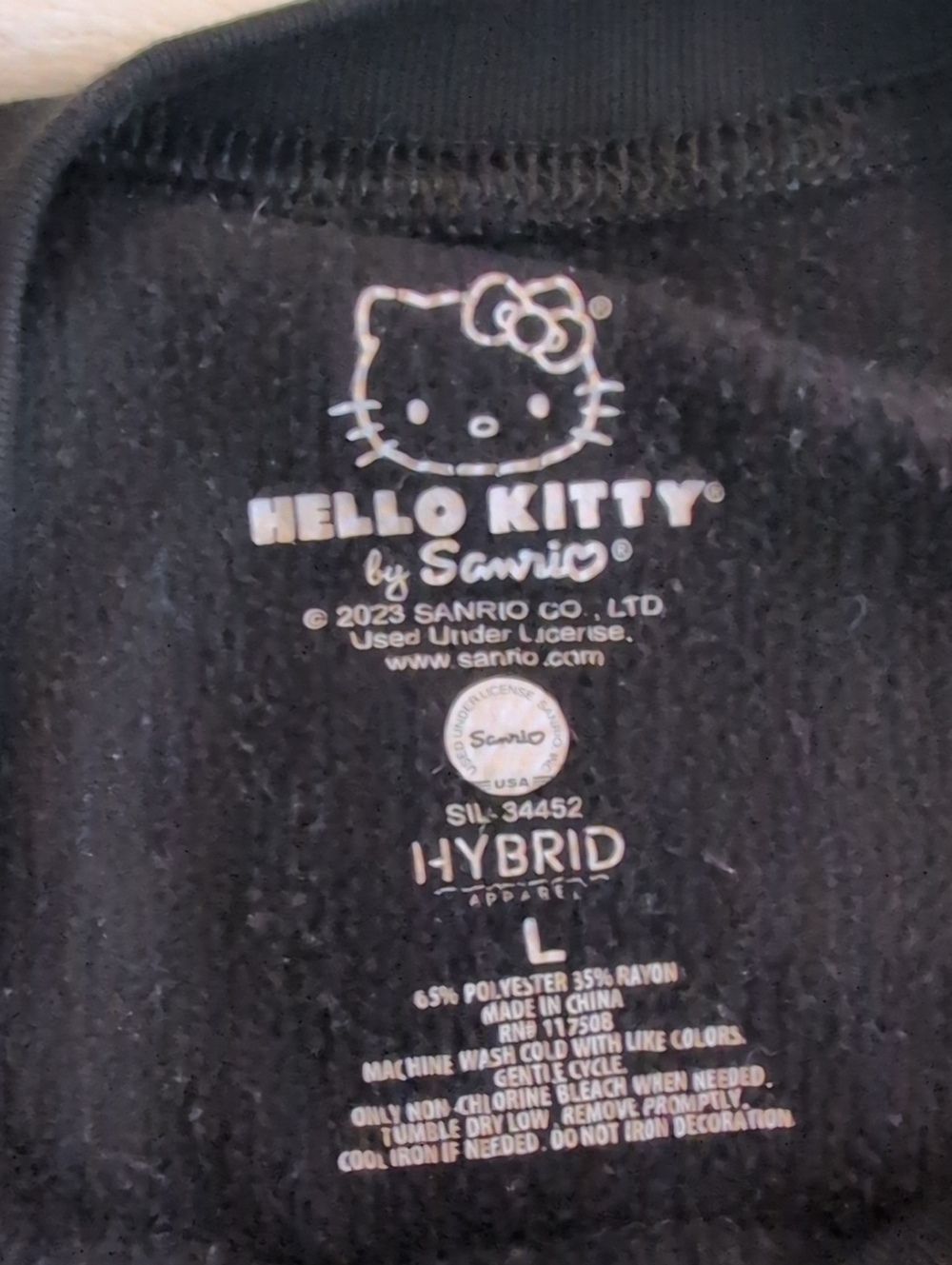Hello Kitty By Sanrio Black Sweatshirt with Red Bow and Blue Outfit - Picture 6 of 6
